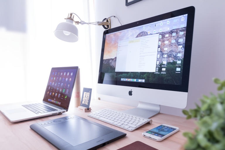 Professional web design and development laptop with modern responsive website mockup